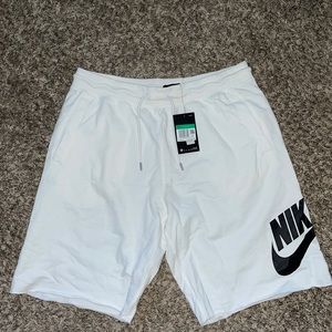 White Nike shorts